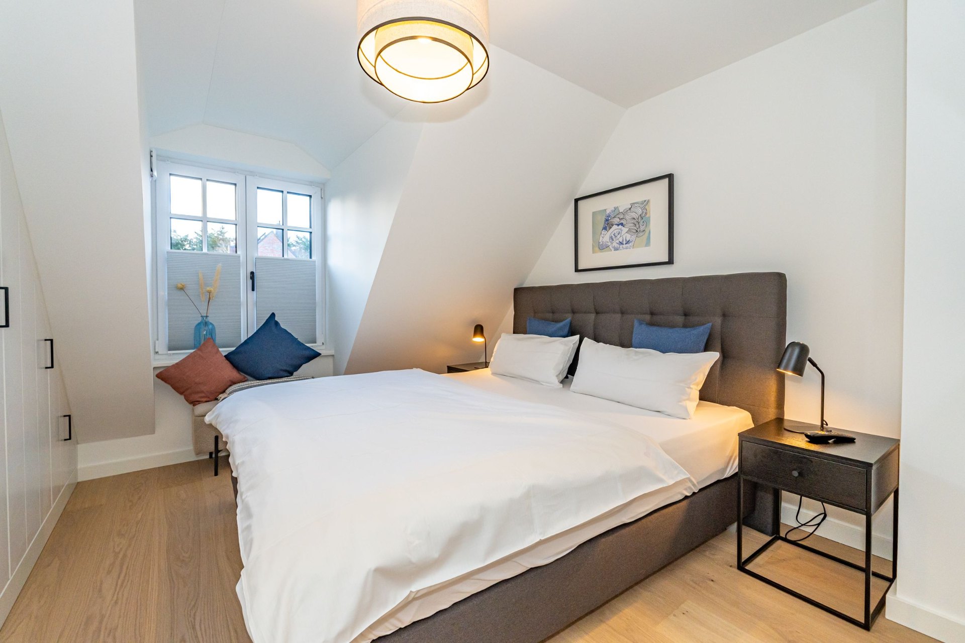 Schlafzimmer mit Doppelbett im Haus Marit